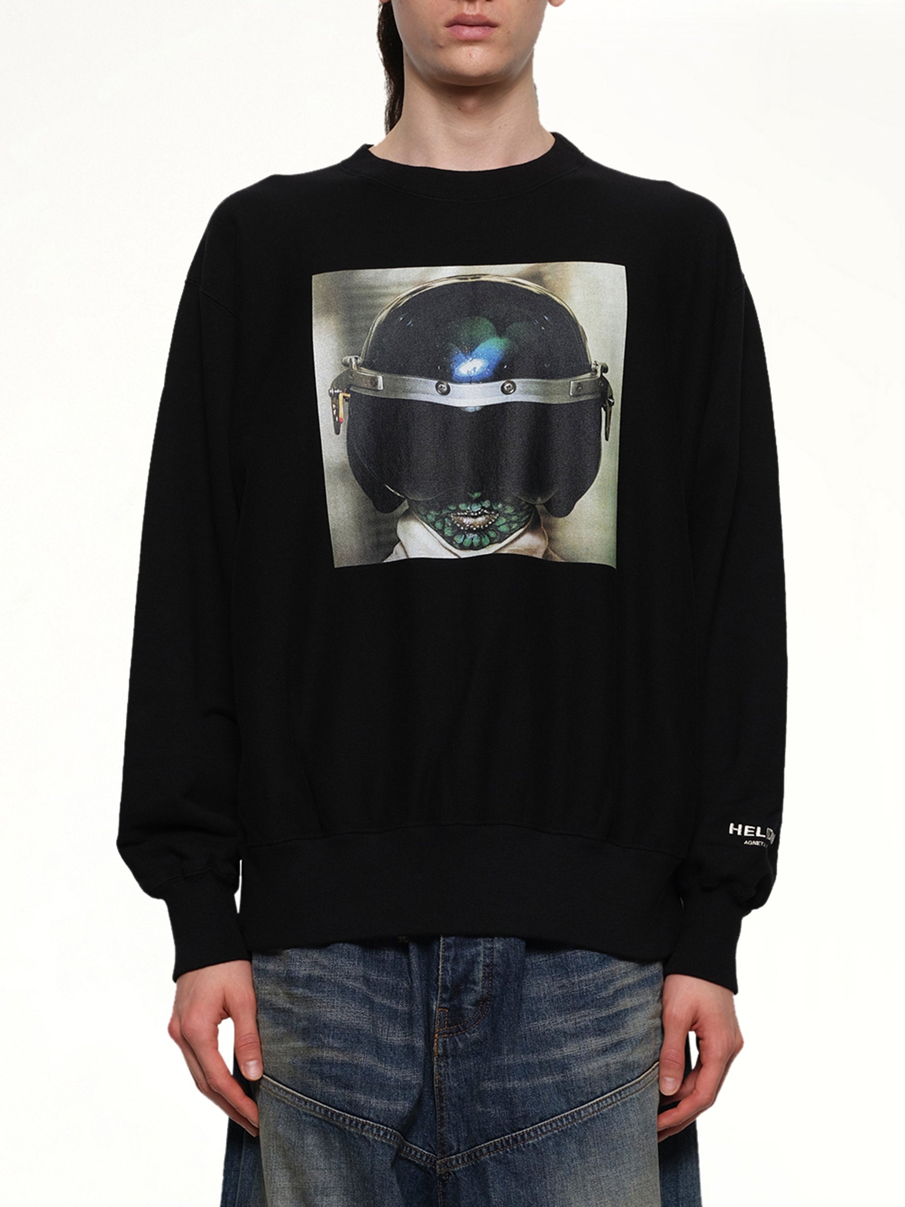 Image of a model wearing Tops. Productname: UNDERCOVER Heldon L/S T-Shirt in BLACK colour by brand - UNDERCOVER