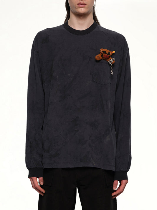 Image of a model wearing Tops. Productname: DOUBLET Long Sleeve T-Shirt With Villain Bear in BLACK colour by brand - DOUBLET