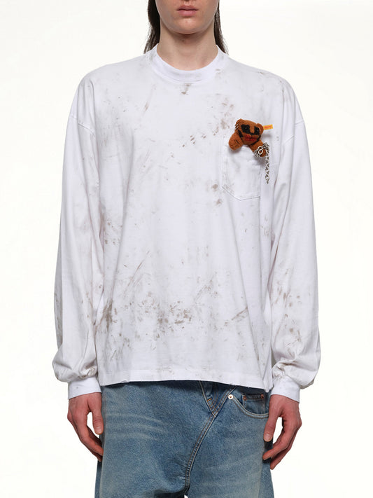 Image of a model wearing Tops. Productname: DOUBLET Long Sleeve T-Shirt With Villain Bear in WHITE colour by brand - DOUBLET