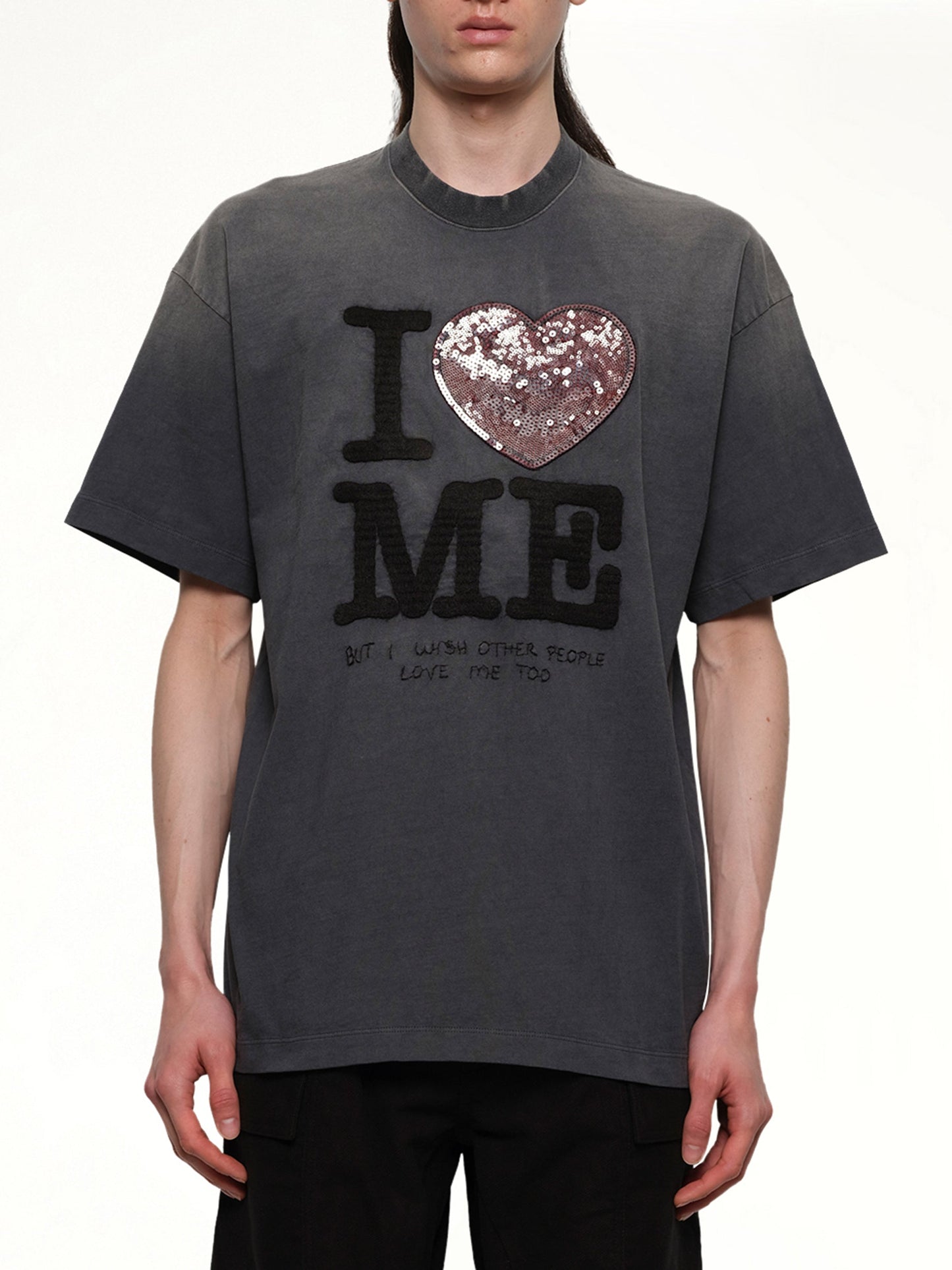 Image of a model wearing Tops. Productname: DOUBLET Grip-Love T-Shirt in BLACK colour by brand - DOUBLET