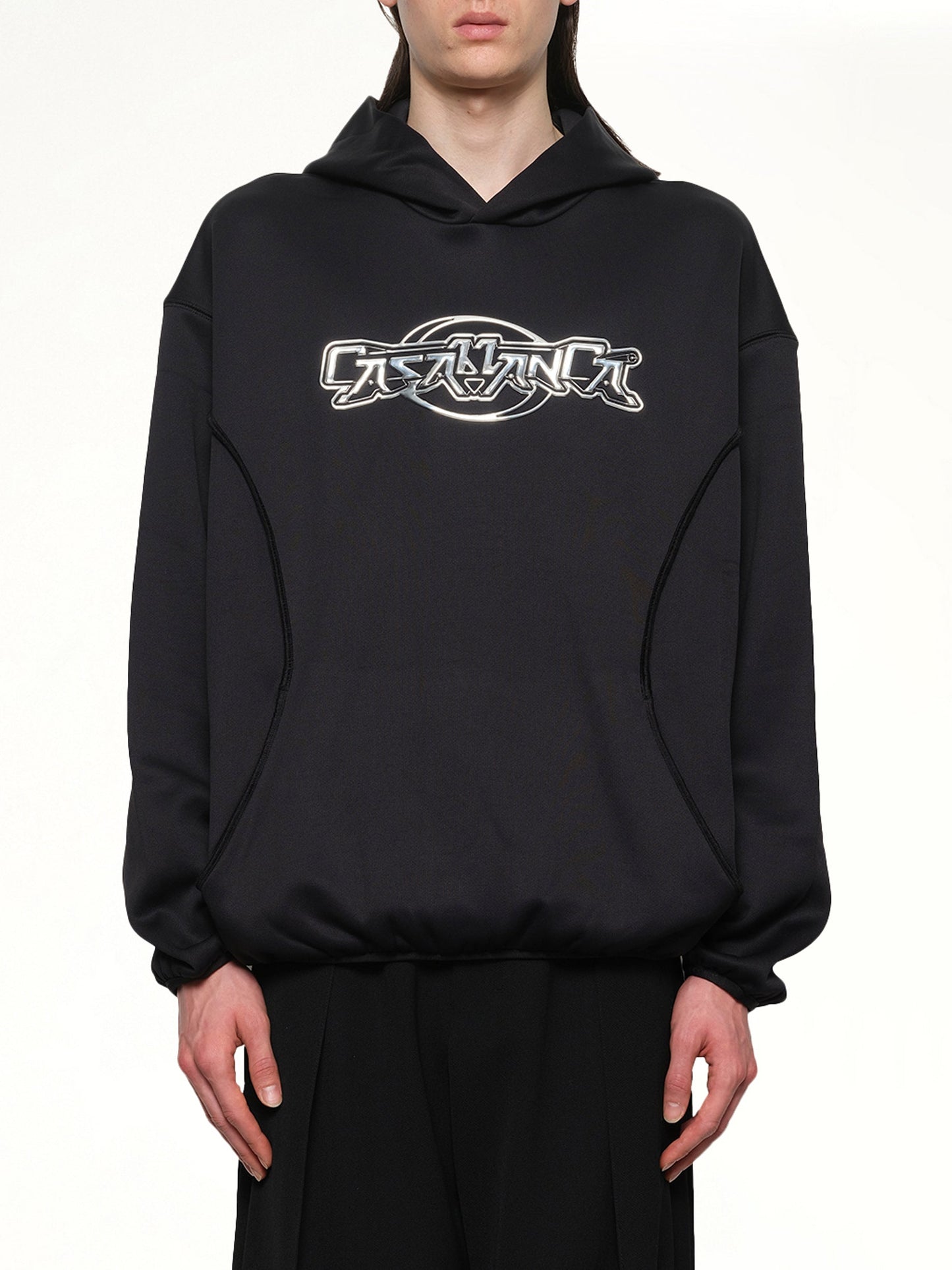 Image of a model wearing Outerwear. Productname: CASABLANCA Oversized Panelled Hoodie in BLACK colour by brand - CASABLANCA