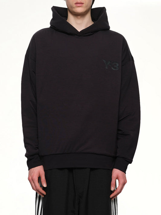 Image of a model wearing Outerwear. Productname: Y-3 Padded Hoodie in Black colour by brand - Y-3