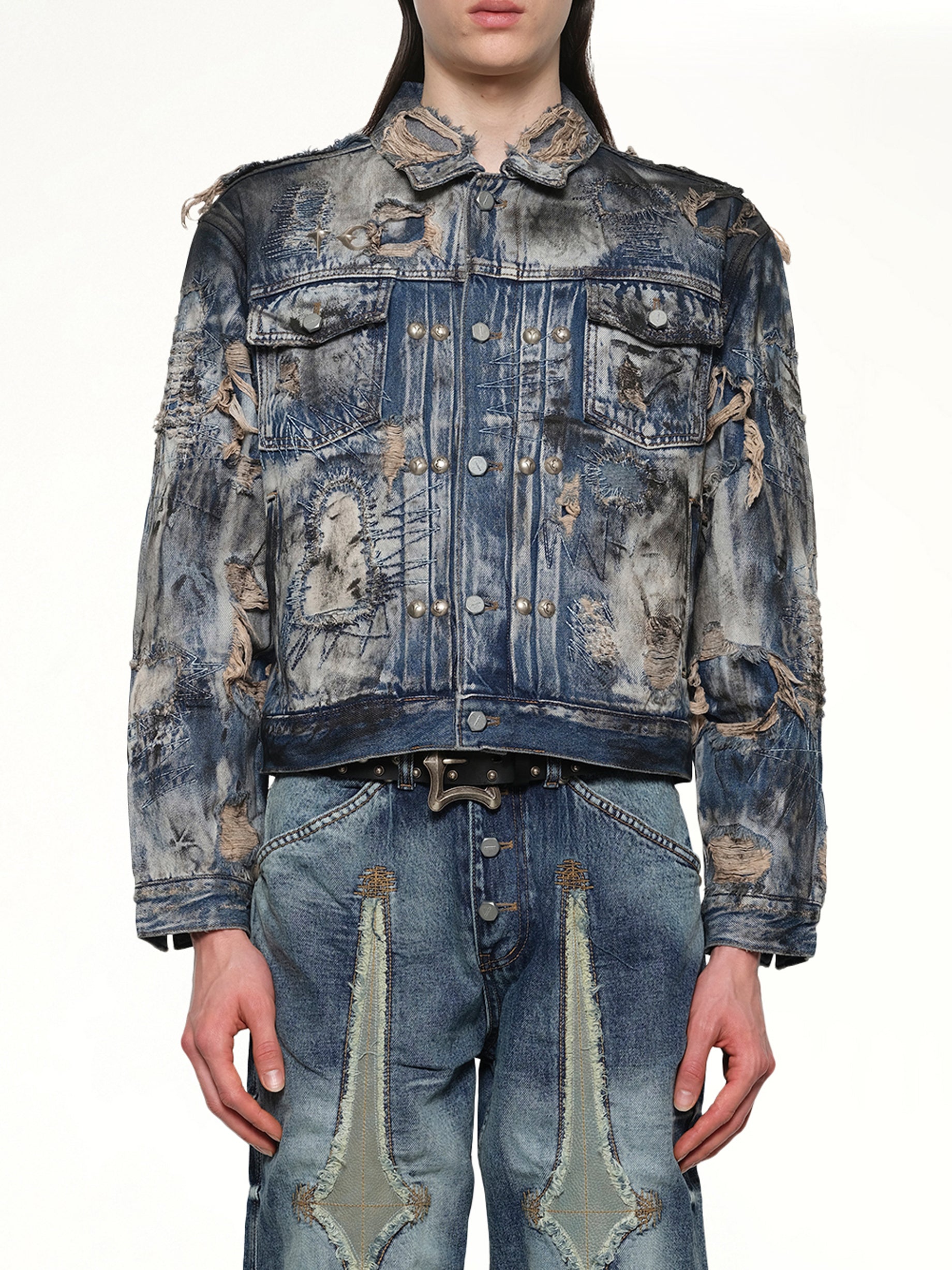 Image of a model wearing Outerwear. Productname: THUG CLUB Hard-Washed Damaged Denim Jacket in Blue colour by brand - THUG CLUB