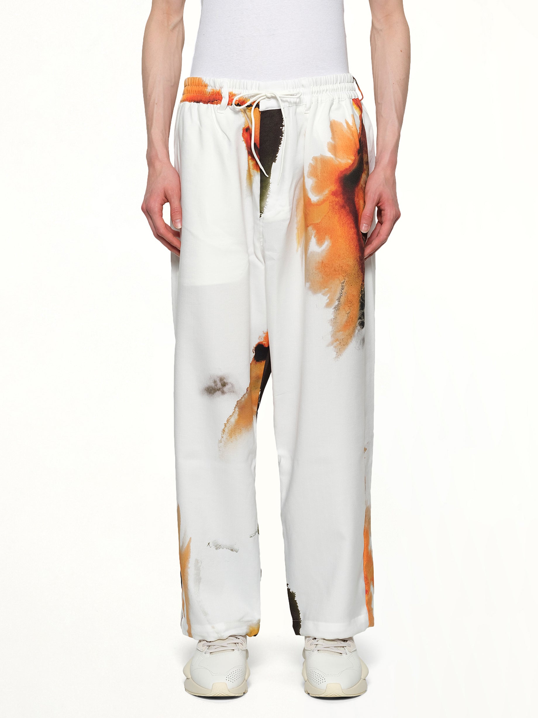 Image of a model wearing Uniforms & Workwear. Productname: Y-3 Aop Sport Uniform Track Pants in White colour by brand - Y-3
