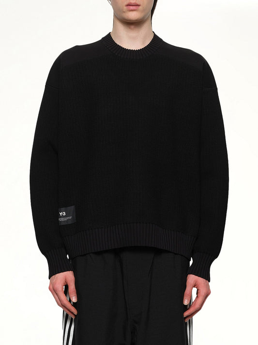 Image of a model wearing Outerwear. Productname: Y-3 Ut Knit Crew Sweater in Black colour by brand - Y-3