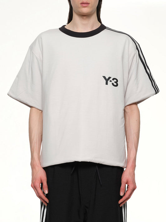 Image of a model wearing Shorts. Productname: Y-3 Padded Short Sleeve T-Shirt 3-Stripes in Grey colour by brand - Y-3