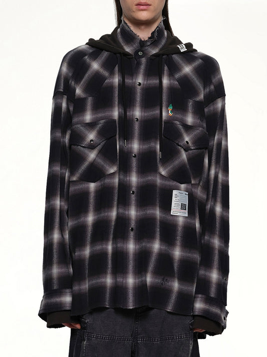 Image of a model wearing Outerwear. Productname: MAISON MIHARA YASUHIRO Sweat Hoodie LS Shirt in BLACK colour by brand - MAISON MIHARA YASUHIRO