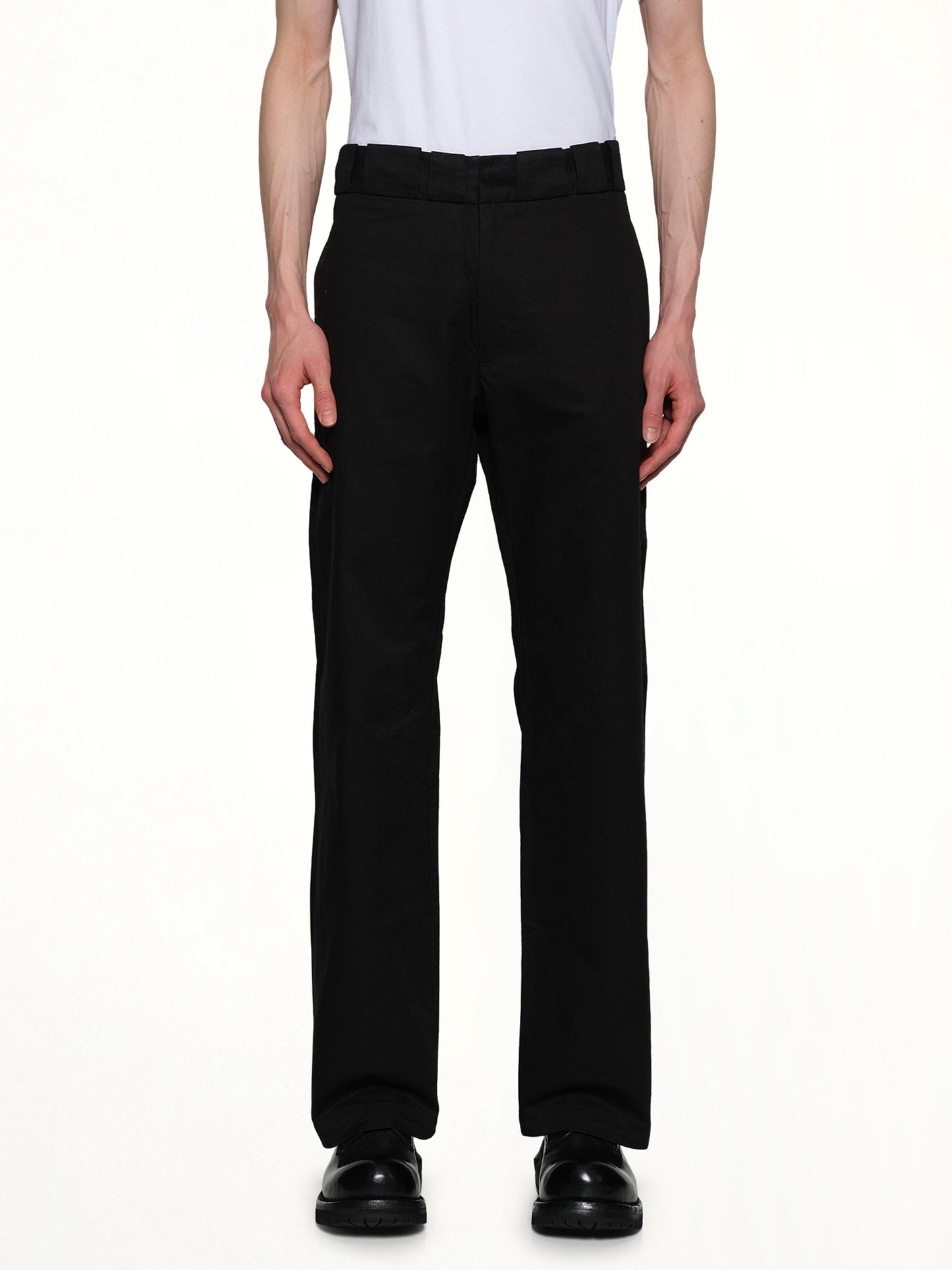 Image of a model wearing Pants. Productname: POST ARCHIVE FACTION Brick Trousers in Black colour by brand - POST ARCHIVE FACTION