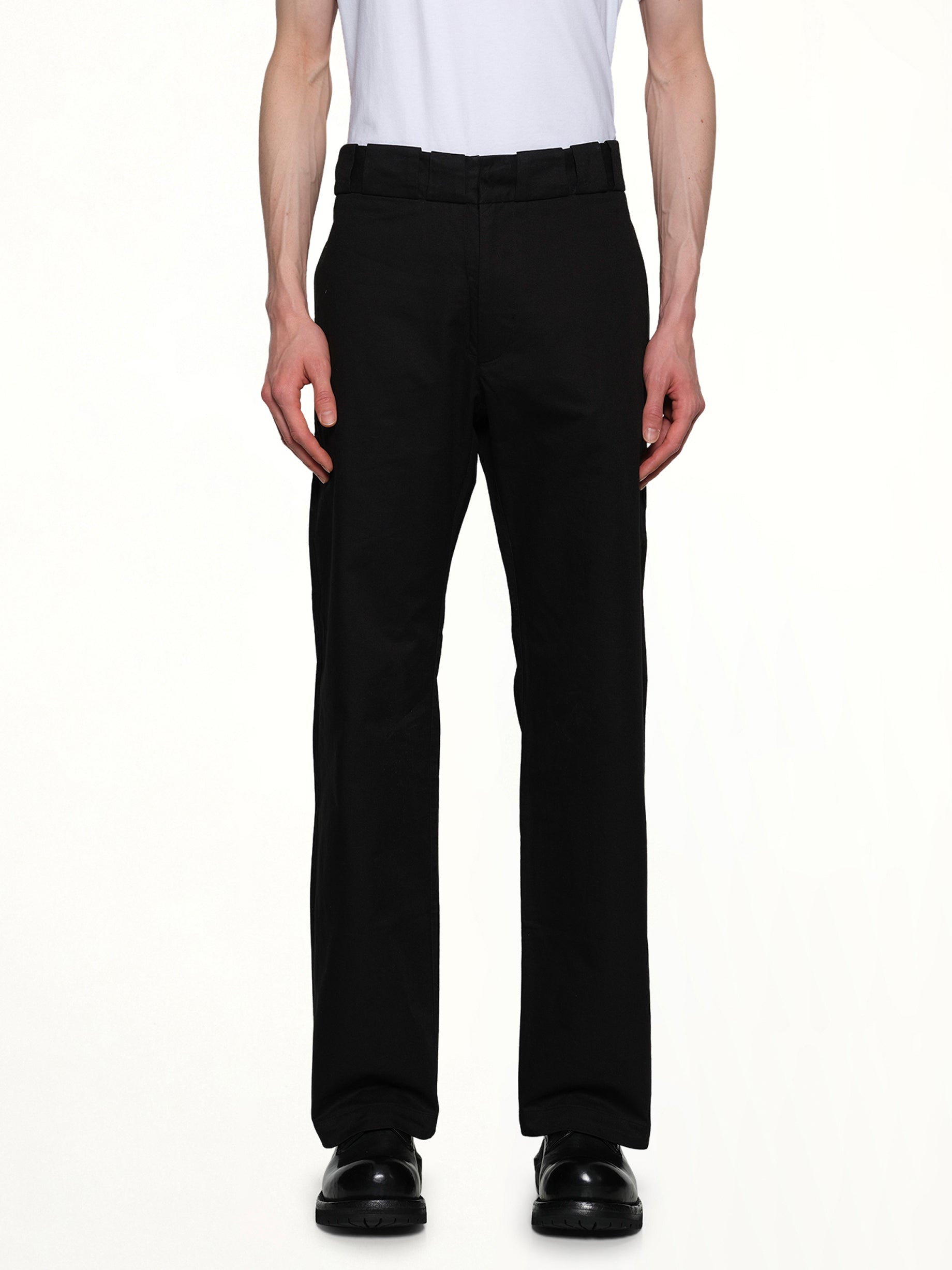 Image of a model wearing Pants. Productname: POST ARCHIVE FACTION Brick Trousers in Black colour by brand - POST ARCHIVE FACTION