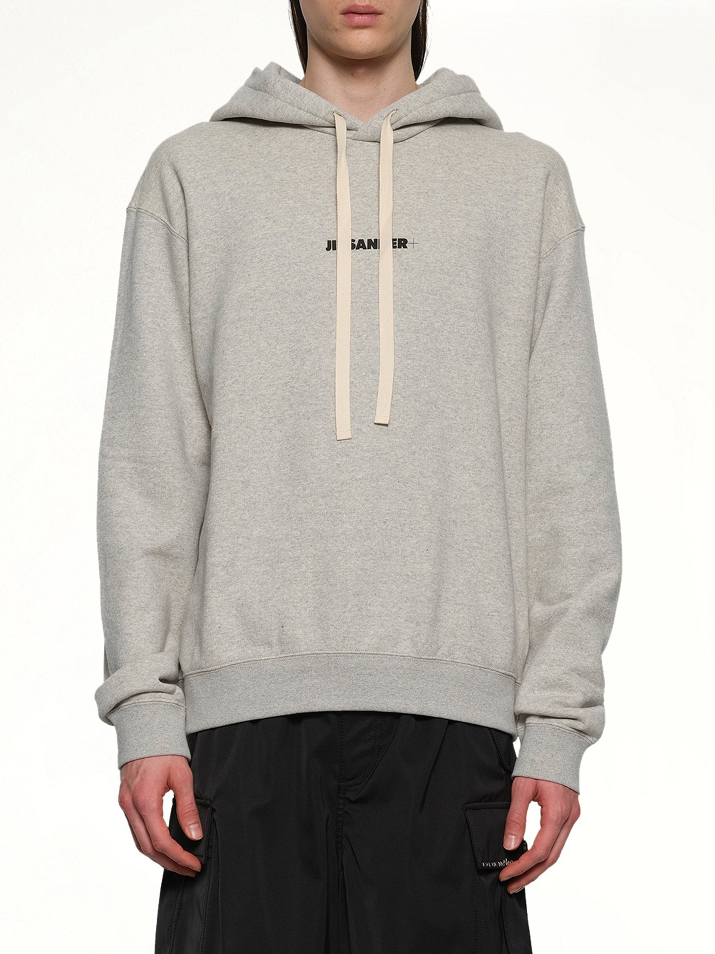 Image of a model wearing Outerwear. Productname: JIL SANDER Plus Compact Terry Hoodie in POWDER GREEN colour by brand - JIL SANDER
