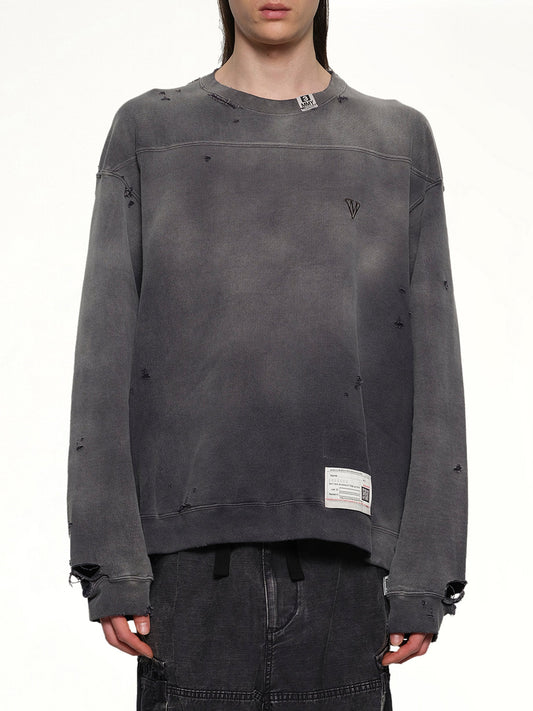 Image of a model wearing Outerwear. Productname: MAISON MIHARA YASUHIRO Sun Faded Pullover in BLACK colour by brand - MAISON MIHARA YASUHIRO