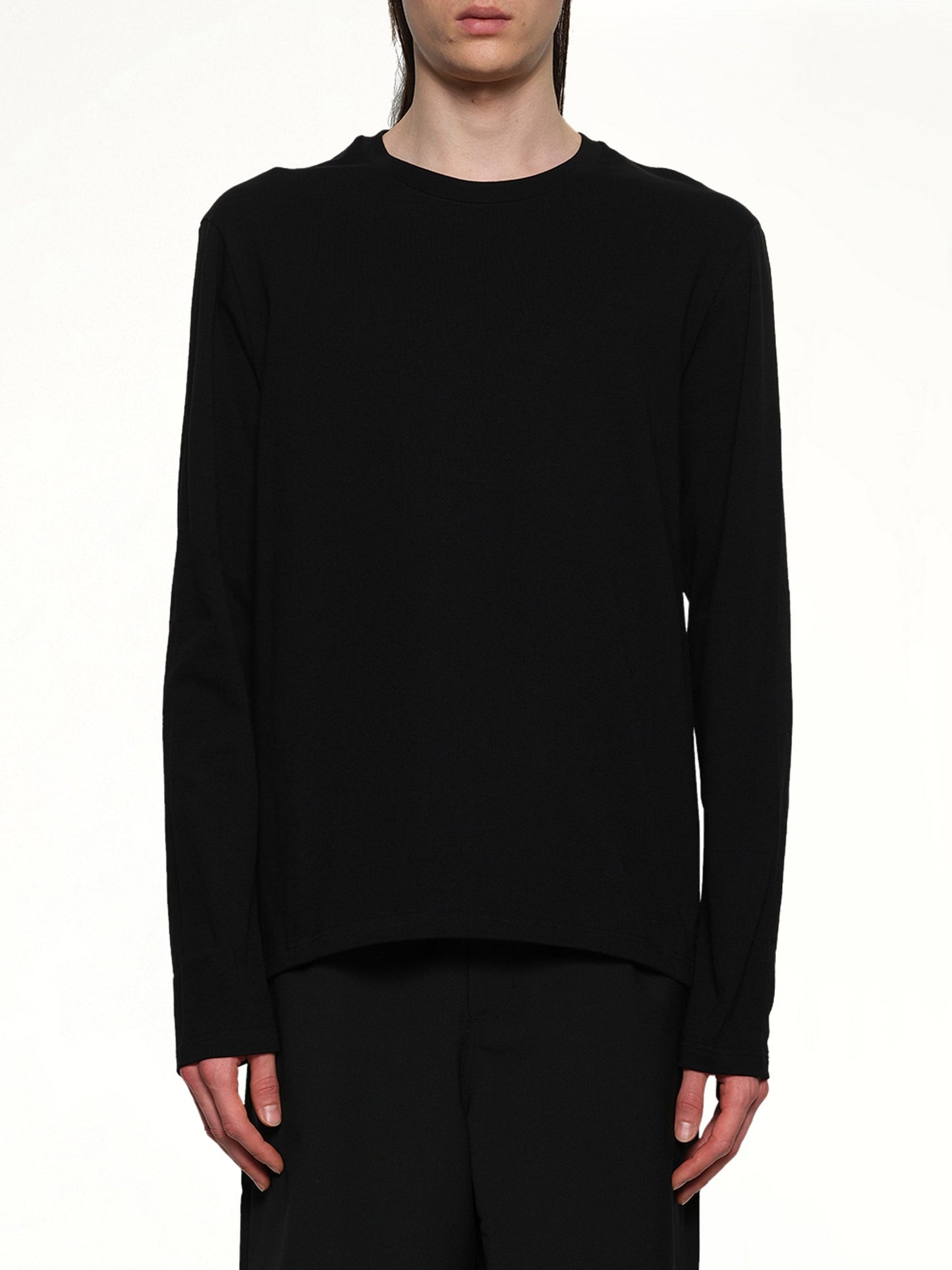 Image of a model wearing Tops. Productname: JIL SANDER Leather Patch Long Sleeve T-Shirt in BLACK colour by brand - JIL SANDER
