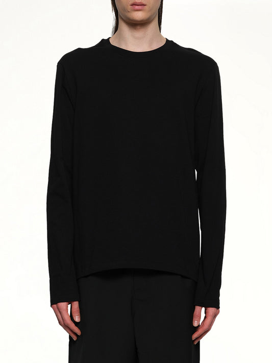 Image of a model wearing Tops. Productname: JIL SANDER Leather Patch Long Sleeve T-Shirt in BLACK colour by brand - JIL SANDER