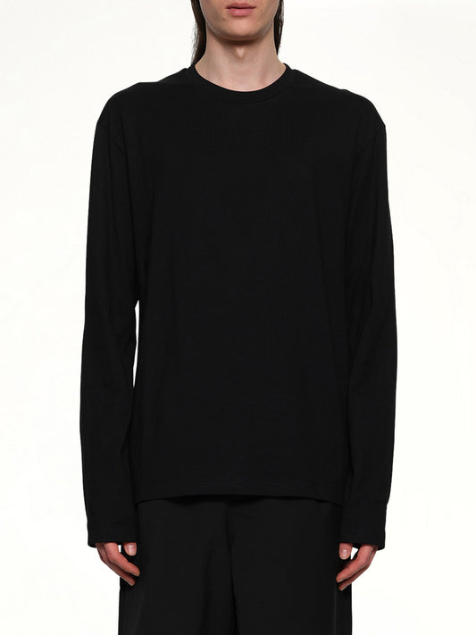 Image of a model wearing Tops. Productname: JIL SANDER Long Sleeve Logo T-Shirt in BLACK colour by brand - JIL SANDER