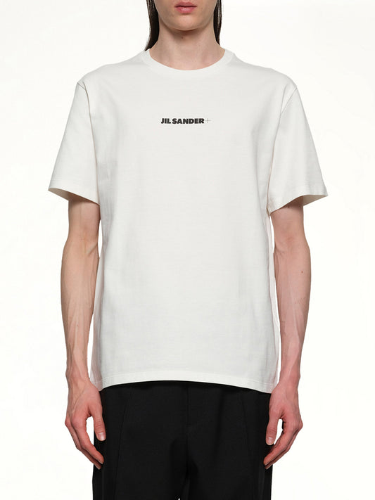 Image of a model wearing Tops. Productname: JIL SANDER Plus Logo T-Shirt in PORCELAIN colour by brand - JIL SANDER