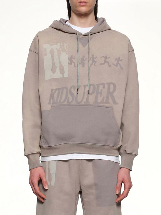 Image of a model wearing Outerwear. Productname: Sun Faded Hoodie in Grey colour by brand - KIDSUPER