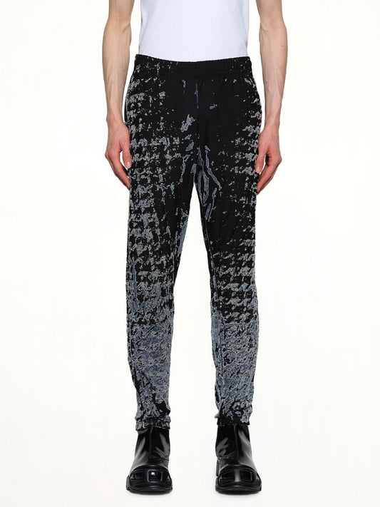 Image of a model wearing Pants. Productname: DIESEL P-LABIS Runway Pants in Black colour by brand - DIESEL