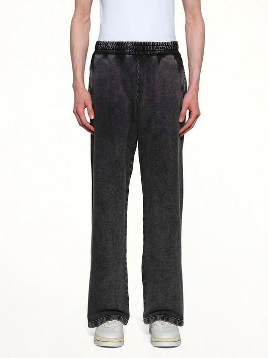Image of a model wearing Pants. Productname: DIESEL P-ALT-SHOW Sweatpants in Washed Grey colour by brand - DIESEL