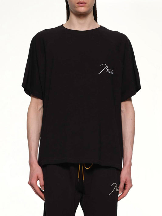 Image of a model wearing Tops. Productname: RHUDE Classique Raglan T-Shirt in BLACK/WHITE colour by brand - RHUDE