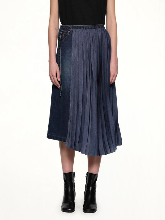 Image of a model wearing Skirts. Productname: SACAI Half Pleated Denim Skirt in Blue colour by brand - SACAI