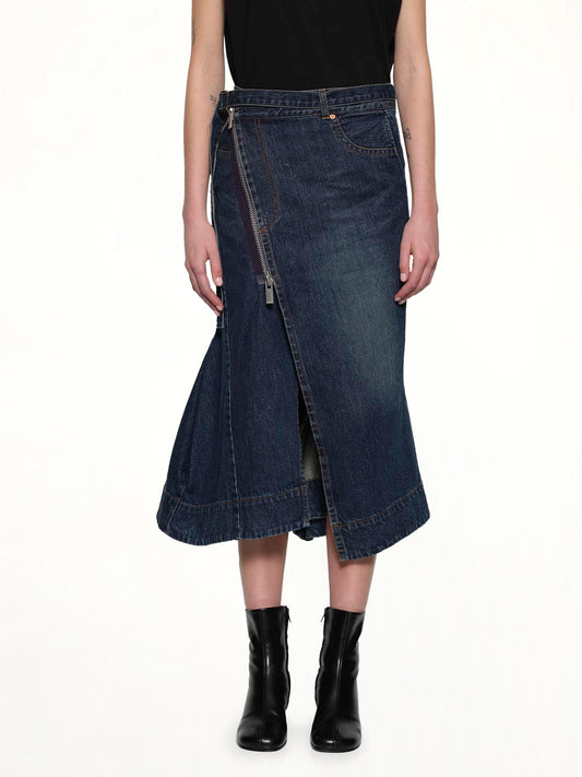 Image of a model wearing Skirts. Productname: SACAI Side Zip Denim Skirt in Blue colour by brand - SACAI