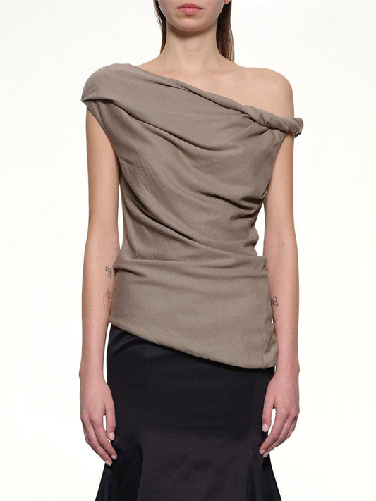 Image of a model wearing Tops. Productname: ENTIRE STUDIOS Jersey Twist Top in BEIGE colour by brand - ENTIRE STUDIOS