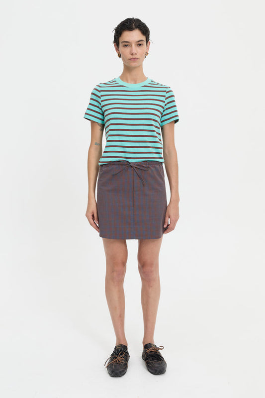 Image of a model wearing Skirts. Product name - Maja Skirt Coffee in Coffee colour by brand - Blanca Studio