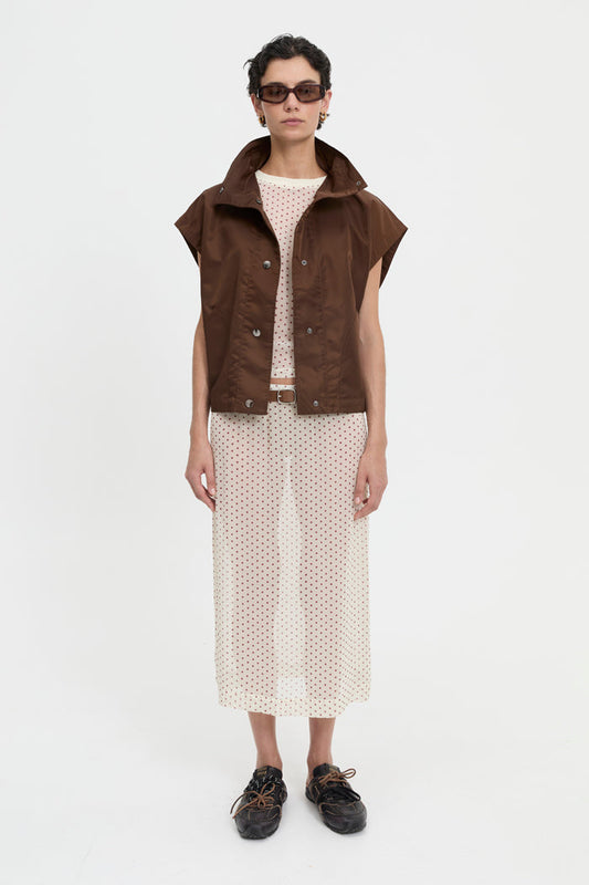 Image of a model wearing Tops. Product name - Virgo Vest Brown in Brown colour by brand - Blanca Studio