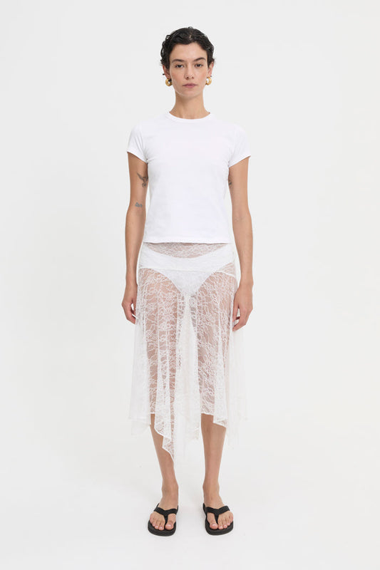 Image of a model wearing Skirts. Product name - Juni Skirt White in White colour by brand - Blanca Studio