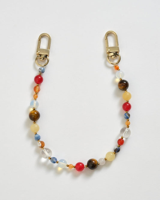 Image of Keychains. Product name - Ipanema Phone Charm Multi in colour by brand - Reliquia Jewellery