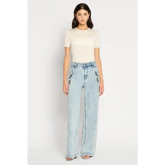 Image of a model wearing Tops. Productname: In Orbit Top in White colour by brand - sass and bide