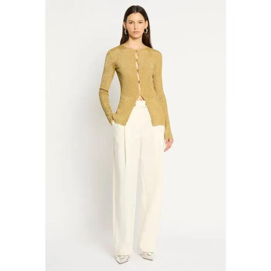 Image of a model wearing Outerwear. Productname: Shimmer Nights Cardi in Gold colour by brand - sass and bide