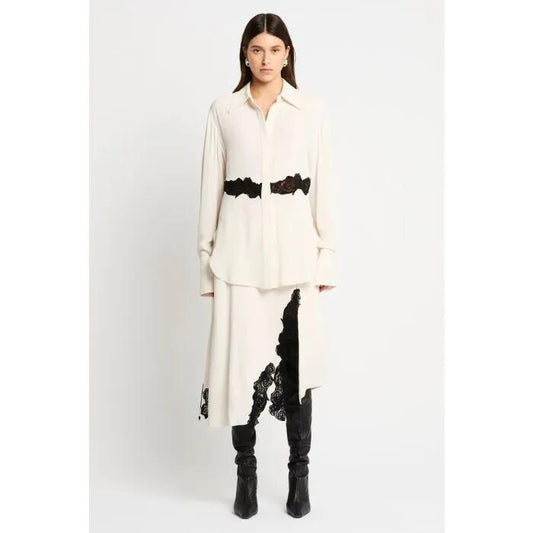 Image of a model wearing Tops. Productname: Pirouette Shirt in Ivory colour by brand - sass and bide