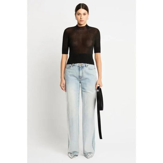 Image of a model wearing Tops. Productname: Lotus Knit Top in Metallic Black colour by brand - sass and bide
