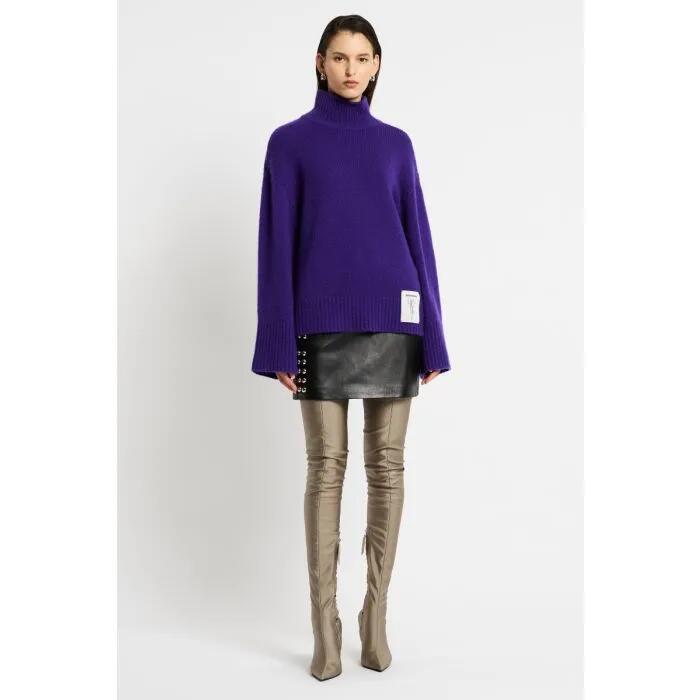 Image of a model wearing Outerwear. Productname: Estilo Cashmere Blend Polo in VIOLA PURPLE colour by brand - sass and bide