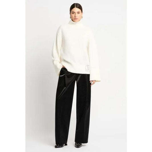 Image of a model wearing Outerwear. Productname: Estilo Cashmere Blend Polo in White colour by brand - sass and bide