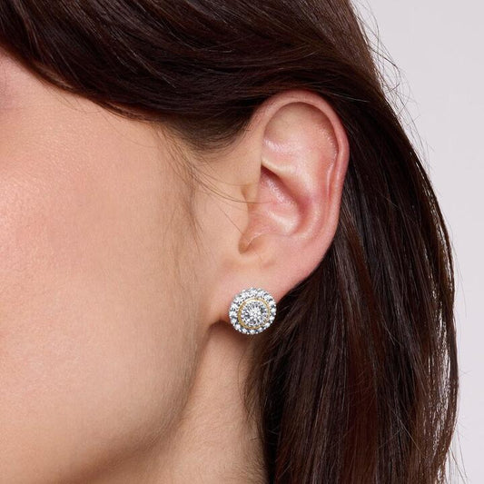 Image of Earrings. Productname: Miracle Halo Bezel Stud Earrings with 0.15ct of Diamonds in 9kt Yellow Gold in Diamond colour by brand - Bevilles