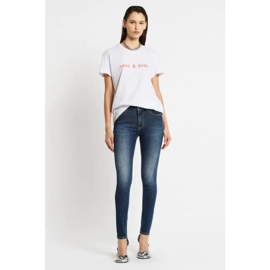 Image of a model wearing Tops. Productname: The Classics Tee in IVORY/PINK LOGO colour by brand - sass and bide