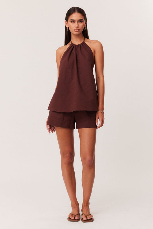 Image of a model wearing Shorts. Productname: SNDYS ISMENE SHORTS in Chocolate colour by brand - SNDYS