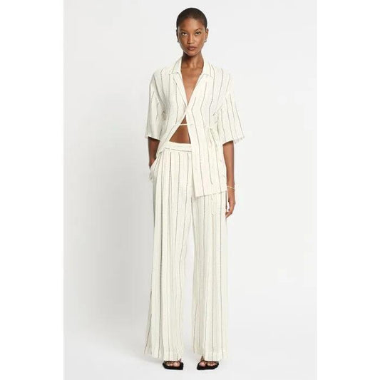 Image of a model wearing Tops. Productname: Raya Wrap Shirt in Ivory colour by brand - sass and bide