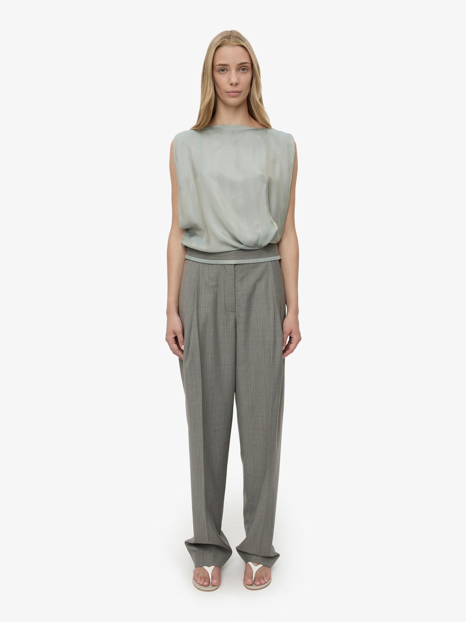 Image of a model wearing Pants. Productname: Sashed Tailored Trouser in Stripe colour by brand - CHRISTOPHER ESBER