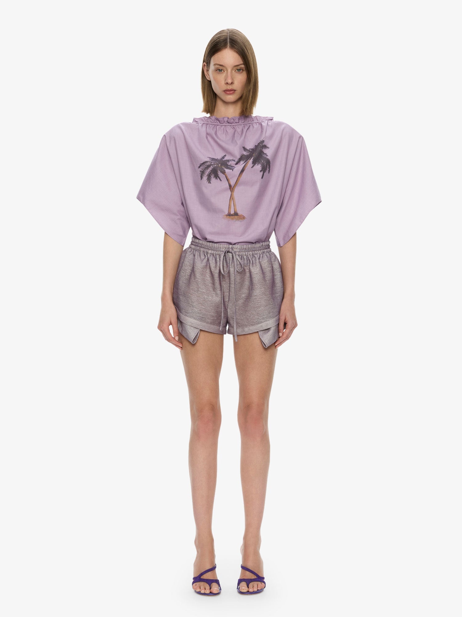 Image of a model wearing Shorts. Productname: Archie Runner in Lilac colour by brand - CHRISTOPHER ESBER