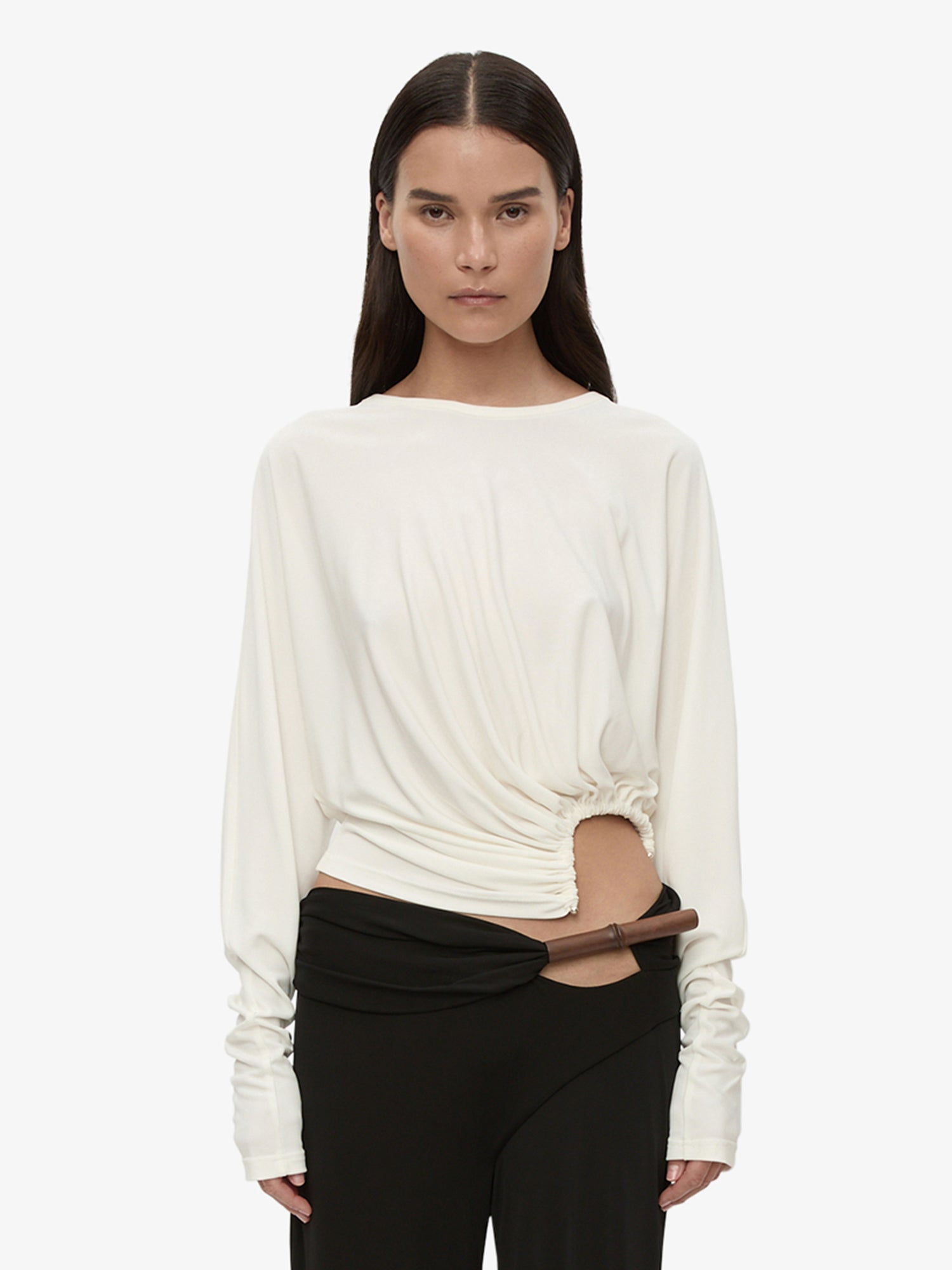 Image of a model wearing Tops. Productname: Manto Long Sleeve Jersey Top in White colour by brand - CHRISTOPHER ESBER