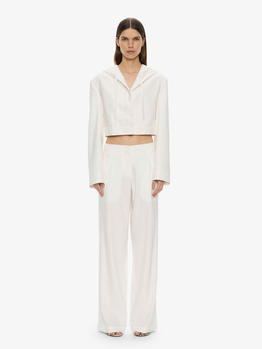 Image of a model wearing Pants. Productname: CHRISTOPHER ESBER Redux Linen Trouser in White colour by brand - CHRISTOPHER ESBER