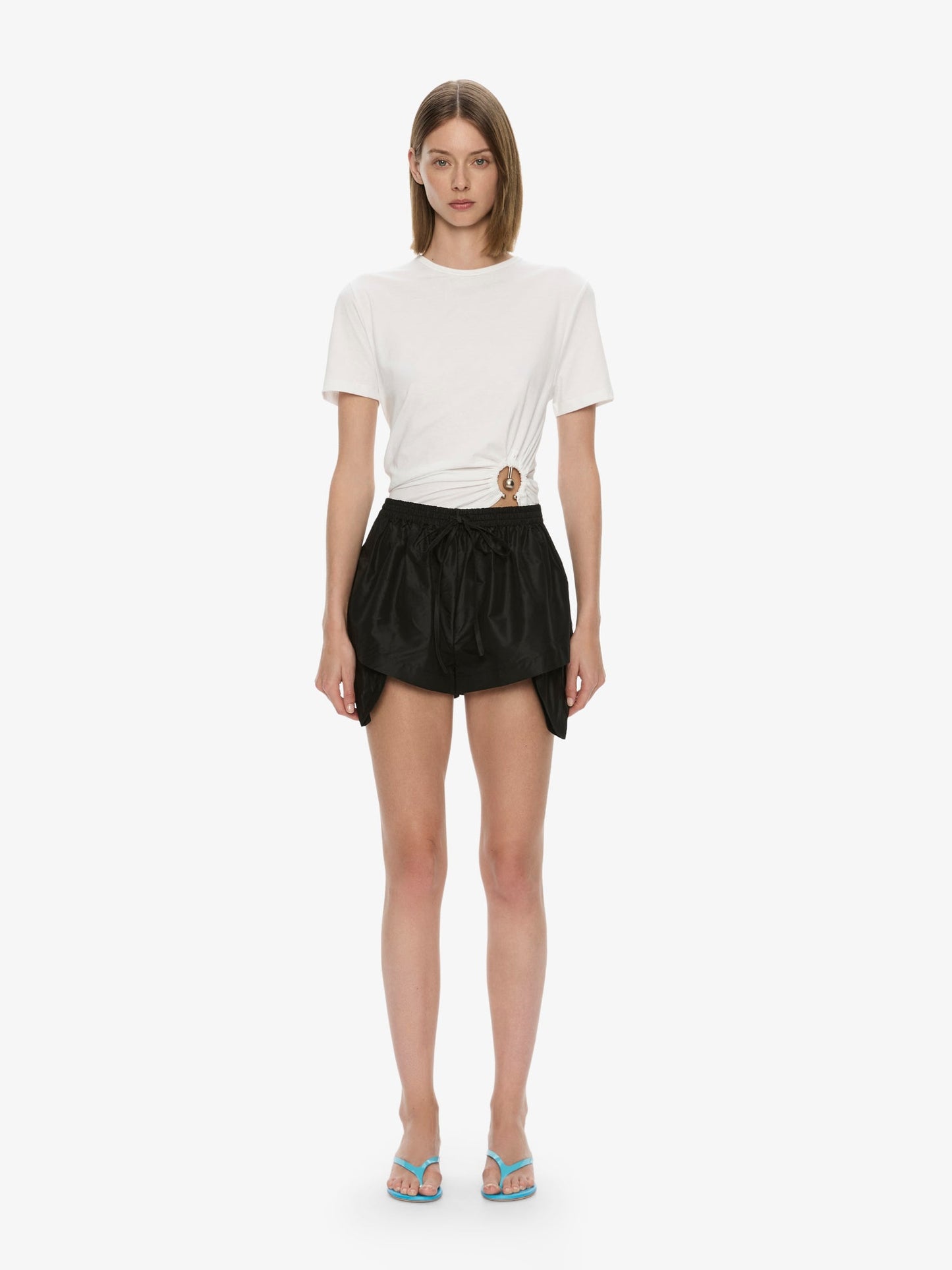 Image of a model wearing Shorts. Productname: Sateen Archie Runner in Black colour by brand - CHRISTOPHER ESBER