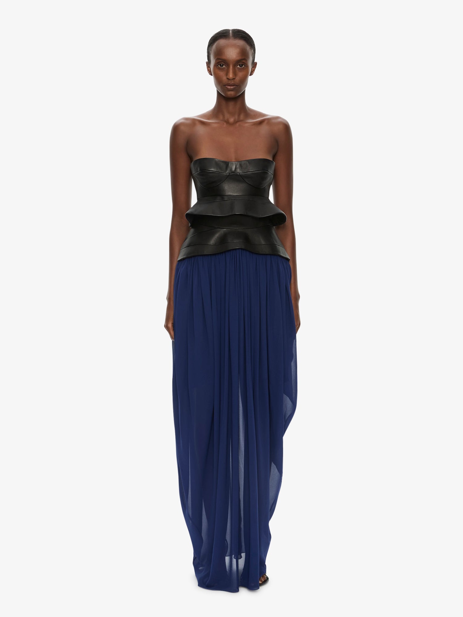 Image of a model wearing Skirts. Product name - Bellona Moulded Leather Belted Skirt in Multi colour by brand - CHRISTOPHER ESBER