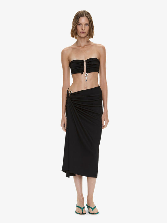 Image of a model wearing Skirts. Product name - Droplet Crystal Clasp Cascade Skirt in Black colour by brand - CHRISTOPHER ESBER