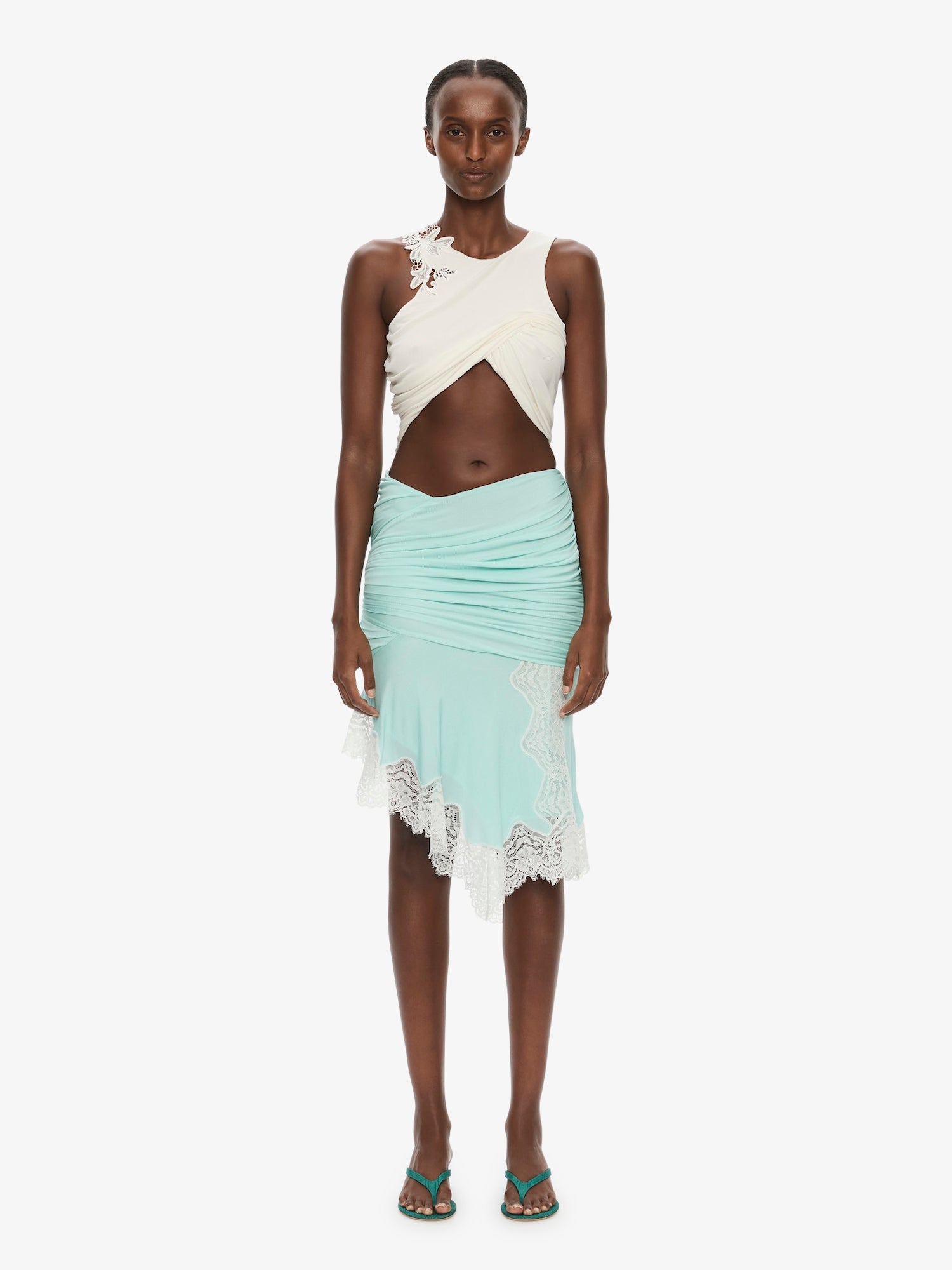 Image of a model wearing Skirts. Product name - Incline Gathered Skirt in White colour by brand - CHRISTOPHER ESBER