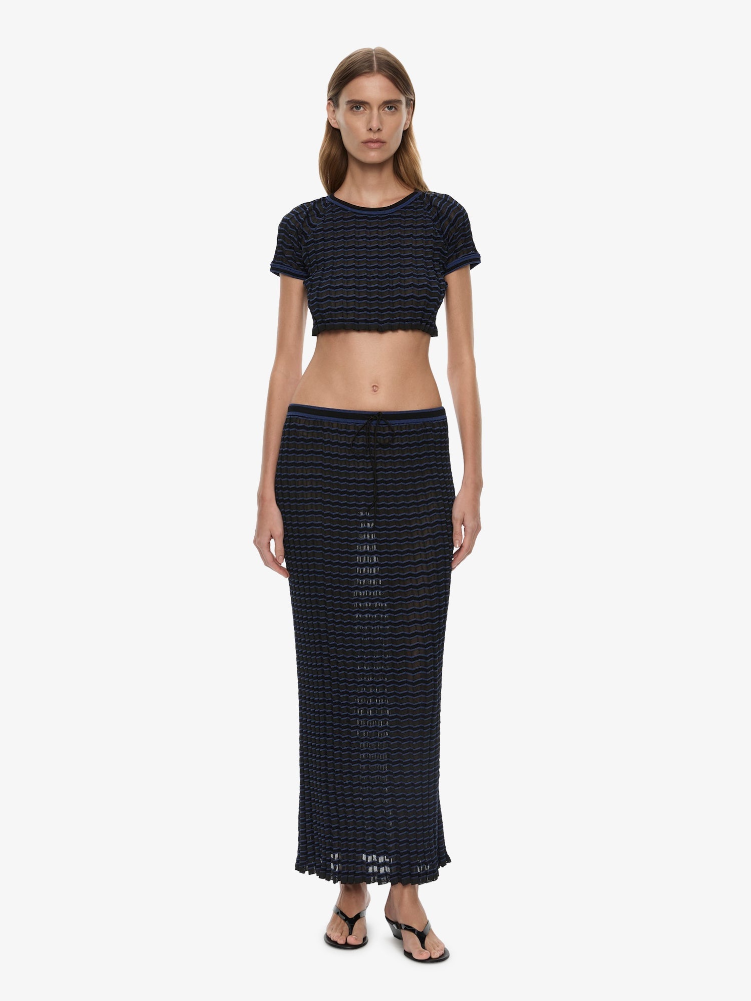 Image of a model wearing Skirts. Product name - Verano Stripe Skirt in Blue colour by brand - CHRISTOPHER ESBER