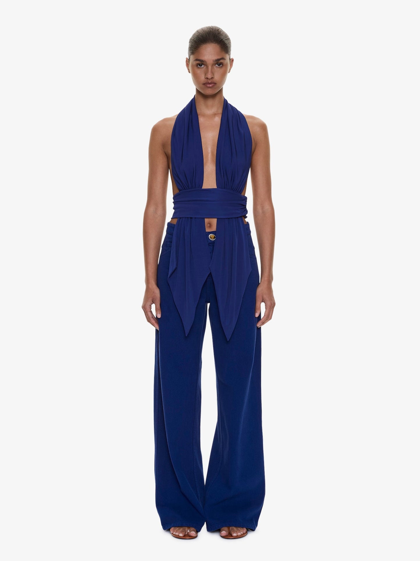 Image of a model wearing Pants. Product name - Relaxed Denim Quartz Jean in Ink colour by brand - CHRISTOPHER ESBER